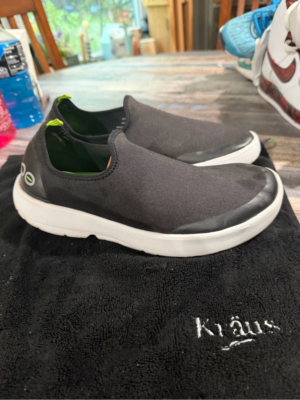 OOFOS Women's Black Slip-On Comfort Loafers with White Sole and Lime Accents
